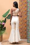 Shop_Rishi and Vibhuti_Ivory Linen Pearls Asymmetric Kylie Blouse And Flared Pant Set_at_Aza_Fashions