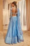 Shop_House of Exotique_Blue Net, Chanderi Embroidery Round Neck Floral Lehenga Set _at_Aza_Fashions