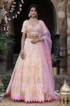 Shop_Nitisha Kashyap Official_Pink Net, Silk Sequins, Beads Asymmetric Tie And Dye Embroidered Lehenga Set _at_Aza_Fashions