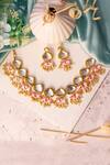 Shop Ishhaara Gold Plated Beads Lotus Drop Choker Set at Aza Fashions Shop_Ishhaara_Gold Plated Beads Lotus Drop Choker Set _at_Aza_Fashions