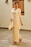 Shop_Palak & Mehak_Ivory Rayon Crepe Lurex Gota Stripe V Neck Mira Kaftan Top With Sharara _at_Aza_Fashions