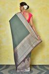 Shop_Nazaakat by Samara Singh_Green Tussar Silk Banarasi Kadwa Weaving Temple Pattern Bordered Saree_at_Aza_Fashions