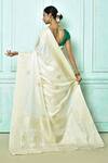 Shop_Nazaakat by Samara Singh_White Soft Banarasi Silk Woven Floral Paisley And Zari Saree For Women_at_Aza_Fashions