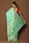 Shop_Samyukta Singhania_Green Silk Woven Foliage Pattern Saree _at_Aza_Fashions