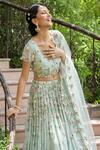 Shop_Summer By Priyanka Gupta_Green Chiffon Beads, Ribbons Round Dutch Garden Embroidered Bridal Lehenga Set_at_Aza_Fashions