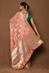 Shop_Samyukta Singhania_Peach Silk Woven Rose Blooming Border Saree _at_Aza_Fashions