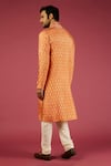 Shop_Krishna Mehta_Orange Tussar Printed Floral Flower Block Kurta Set _at_Aza_Fashions