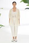 Shop_Nikasha_Cream Jamdani Cotton And Hand Reversible Tiered Jacket _at_Aza_Fashions