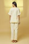 Shop_Kalakaari By Sagarika_White Cotton Lace V-neck Stripe Print Top And Pant Set _at_Aza_Fashions