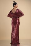 Shop_Kommal Sood_Maroon Lycra Stretch Net Embroidered Sequins Cape Sleeve Gown  _at_Aza_Fashions