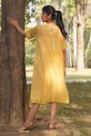 Shop_Dhaari_Yellow Handwoven Cotton Silk Hand Smocked Round Dress _at_Aza_Fashions