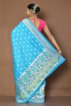 Shop_Nazaakat by Samara Singh_Blue Handloom Cotton Flower Paithani Work Saree_at_Aza_Fashions