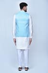 Shop_Khwaab by Sanjana Lakhani_Sky Blue Kurta And Pant: Art Silk Woven Leaf Bundi & Off White Set For Men_at_Aza_Fashions
