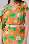 Shop Tangerine Tiger Orange 100% Rayon Crepe Lotus Asymmetric Print Top And Skirt Set at Aza Fashions Shop_Tangerine Tiger_Orange 100% Rayon Crepe Lotus Asymmetric Print Top And Skirt Set _at_Aza_Fashions