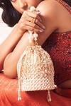 Shop_Forever Noor_Peach Embellished Paisley Handcrafted Bucket Bag _at_Aza_Fashions
