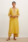 Shop_Devnaagri_Yellow Chanderi And Organza Dori, Sequins Notched Floral Embroidered Kurta Set _at_Aza_Fashions
