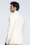 Shop_S&N by Shantnu Nikhil_Off White Suiting Fabric Embroidered Patch Logo Bandhgala _at_Aza_Fashions