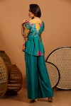 Shop_Garo_Blue Silk Muslin Printed Abstract Round Peplum Top And Flared Pant Set _at_Aza_Fashions