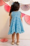 Shop_TINY COLOR_Sky Blue Mul Cotton Printed Floral Tassel Tie Up Dress _at_Aza_Fashions