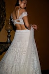 Shop Nadine Dhody Off White Tulle Crystals, Sequins, Embroidery Sophie Hand Lehenga Set at Aza Fashions Shop_Nadine Dhody_Off White Tulle Crystals, Sequins, Embroidery Sophie Hand Lehenga Set _at_Aza_Fashions