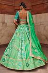 Shop_Aditi Gupta_Green Banarasi Woven Reindeer Chanderi Butterflies And Pattern Bridal Lehenga Set _at_Aza_Fashions