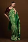 Devissha_Green Pure Katan Silk Handwoven Paisley Banarasi Saree _Online_at_Aza_Fashions