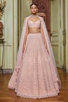 Shop_Seema Gujral_Gold Net Embroidery Pearls And Crystals Leaf Neck Bridal Lehenga Set  _at_Aza_Fashions