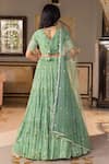 Shop_suruchi parakh_Green Georgette Woven And Embroidered Floral Pattern Sweetheart Tiered Lehenga Set_at_Aza_Fashions