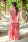 Shop_MONK & MEI BY SONIA ANAND_Peach Georgette Embroidered Chikankari Round Flared Jumpsuit _at_Aza_Fashions