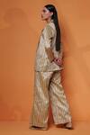 Shop_Taisha_Brown Pure Katan Silk Hand Woven Geometric Pattern Flared Pant _at_Aza_Fashions