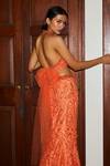 Shop_Nadine Dhody_Orange Tulle Crystals, Sequins, Embroidery Halter Roxanne Hand Lehenga Set _at_Aza_Fashions