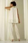 Shop Sakshi Khetterpal Ivory Chanderi Pearls, Beads, Embroidery Halter Neck Top And Pant Set at Aza Fashions Shop_Sakshi Khetterpal_Ivory Chanderi Pearls, Beads, Embroidery Halter Neck Top And Pant Set _at_Aza_Fashions