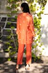 Shop_Kapraaaha_Orange Muslin Embroidered Floral Collared Neck Shirt And Pant Set _at_Aza_Fashions