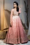 Shop_Kanj by Priyanka A Sakhuja_Peach Net Embroidered Sequin Illusion Sweetheart Nigar Flared Gown  _at_Aza_Fashions