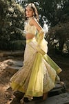 Shop_The House of Exotique_Ivory Net Embroidered Crystal Scoop Embellished Bridal Lehenga Set  _at_Aza_Fashions