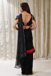 Shop_Archana Kochhar_Black Lycra Embroidered Swarovski V Cosmic Twirl Pre-stitched Saree With Blouse _at_Aza_Fashions