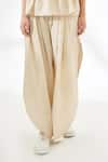 Shop_Nikasha_Cream Cotton Pleated Pant _at_Aza_Fashions