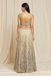 Shop Izzumi Mehta Beige Net Floral Plunge V Neck Hand Embroidered Lehenga Choli Set at Aza Fashions Shop_Izzumi Mehta_Beige Net Floral Plunge V Neck Hand Embroidered Lehenga Choli Set _at_Aza_Fashions