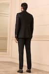 Shop_Tarun Tahiliani_Black Bandhgala  Suiting Fabric Textured Overlapped And Jodhpuri Trouser Set _at_Aza_Fashions