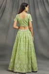 Shop Naintara Bajaj Green Organza Embroidery V-neck Geometric And Floral Lehenga Set at Aza Fashions Shop_Naintara Bajaj_Green Organza Embroidery V-neck Geometric And Floral Lehenga Set _at_Aza_Fashions