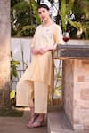 Linen Bloom_Peach 100% Linen Round Embroidered Asymmetric Kurta _Online_at_Aza_Fashions