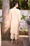 Shop_Linen Bloom_Peach 100% Linen Round Embroidered Asymmetric Kurta _at_Aza_Fashions