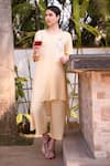 Shop_Linen Bloom_Peach 100% Linen Round Embroidered Asymmetric Kurta _Online_at_Aza_Fashions