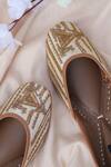 Stitched Soles_Off White Embellished Gold Dust Embroidered Juttis_Online_at_Aza_Fashions