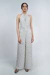 Buy Geisha Designs White Halter Trinity Sequin Backless Jumpsuit at Aza Fashions Buy_Geisha Designs_White Halter Trinity Sequin Backless Jumpsuit _at_Aza_Fashions
