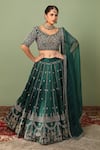 Buy_Neha Khullar_Green Raw Silk Embroidery Leaf Neck Bridal Lehenga Set _at_Aza_Fashions