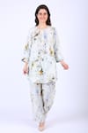 Linen Bloom_White 100% Linen Printed Wild Flowers Motifs Round Tunic _Online_at_Aza_Fashions