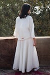 Shop Nikasha White Cotton Embroidered Wrap Skirt at Aza Fashions Shop_Nikasha_White Cotton Embroidered Wrap Skirt _at_Aza_Fashions