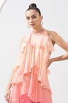 Shop_Mandira Wirk_Pink Chiffon And Embellishment Floral Halter Neck Ombre Tiered Gown _at_Aza_Fashions