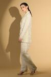 Shop_Geisha Designs_White Nylon Embroidered Sequins Lapel Collar Thread Jacket And Pant Set  _Online_at_Aza_Fashions